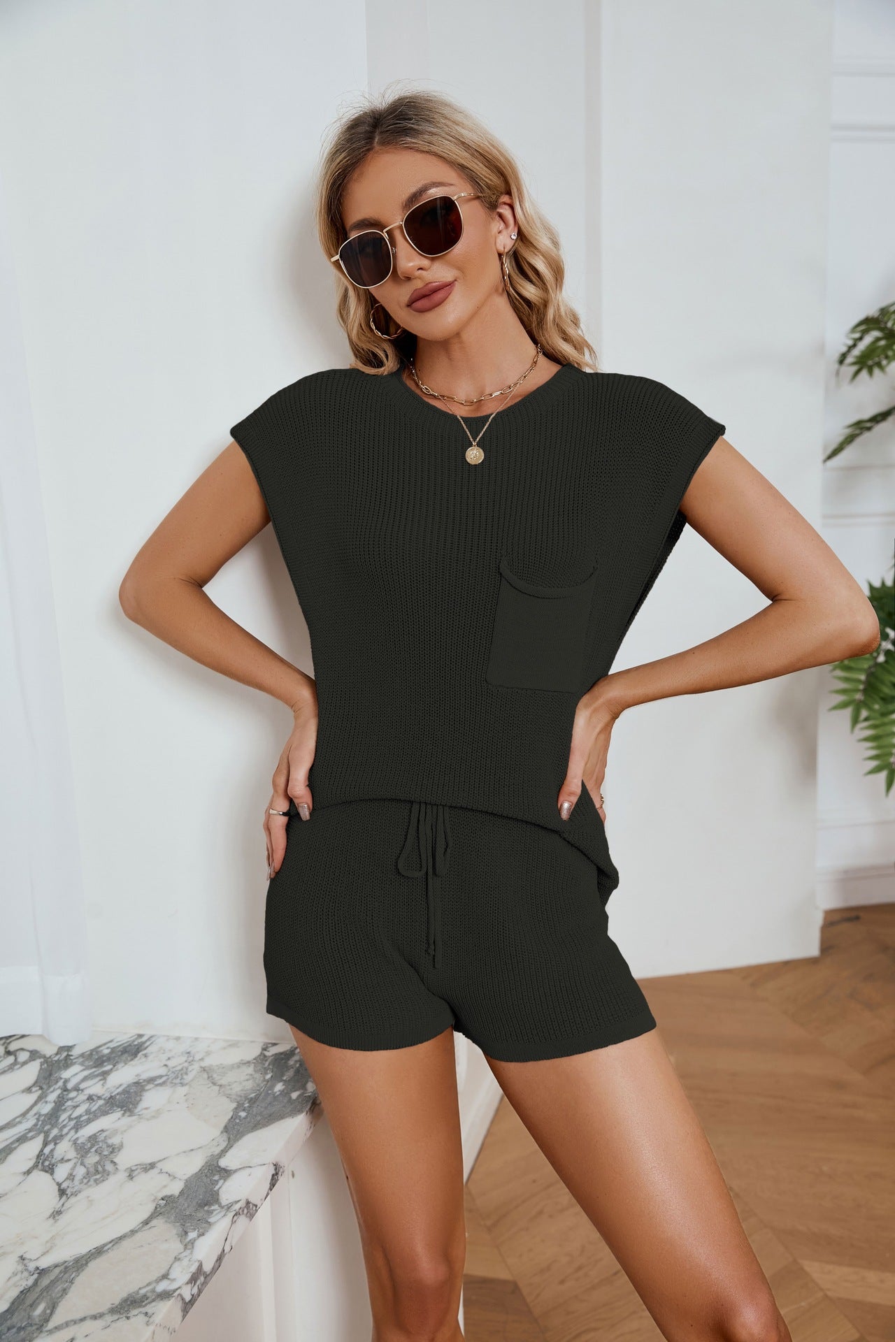 Conjunto de camiseta sin mangas y pantalones cortos de malla